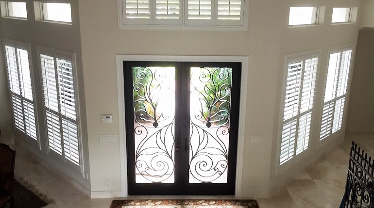 Cleveland foyer with glass doors and indoor shutters